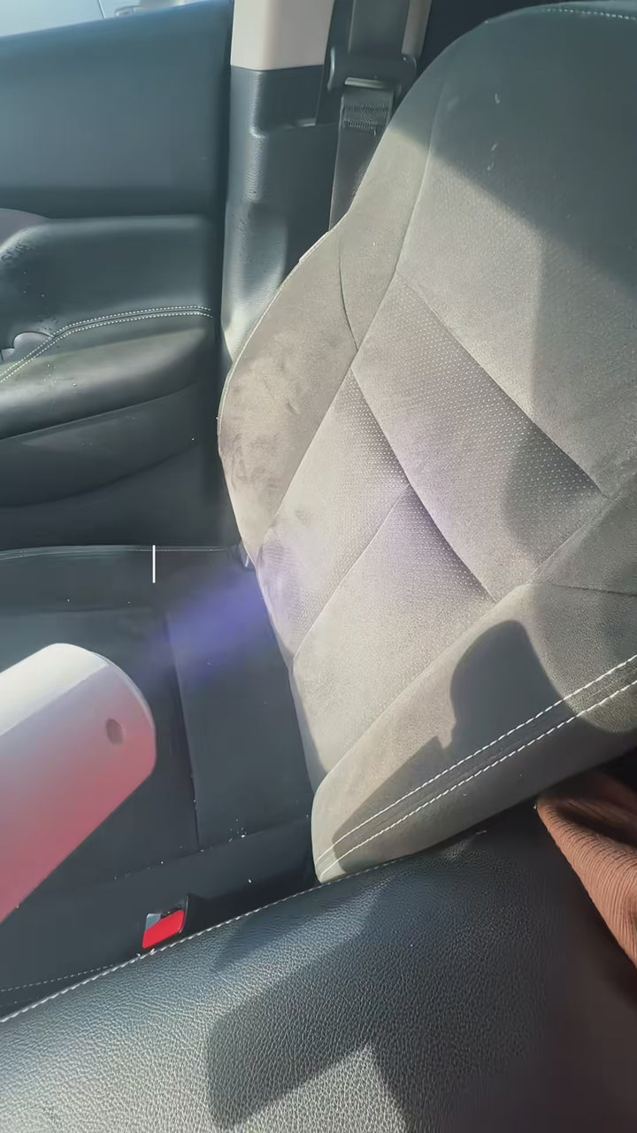 The kit with its four scents, misting a couch